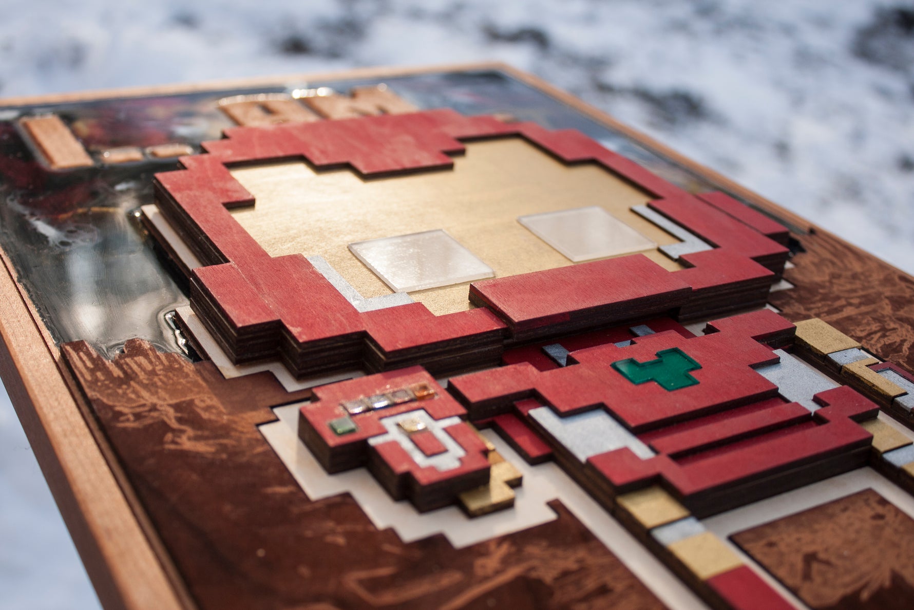 8 bit iron hero with glowing parts, made of wood, resin and acrylic