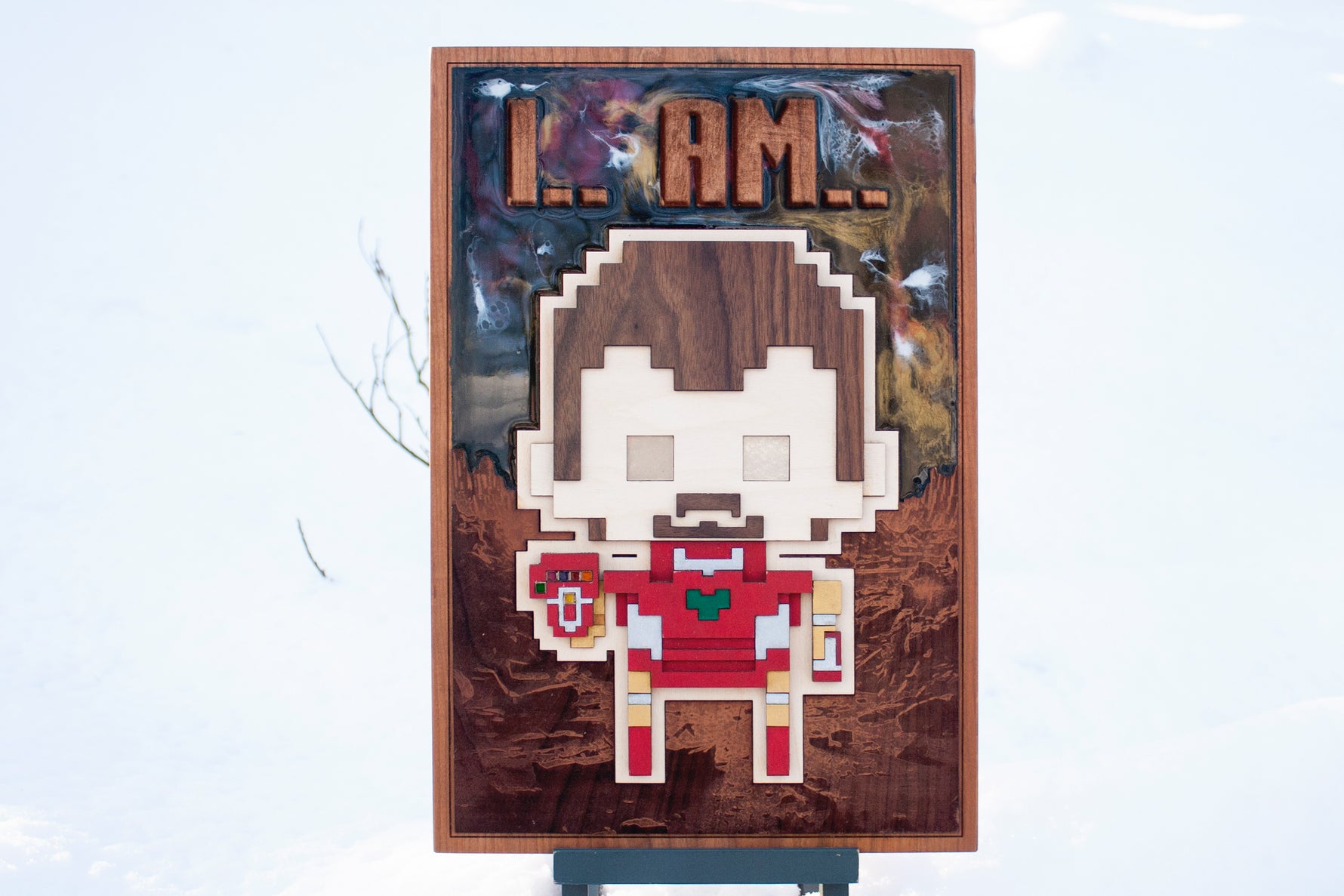 8 bit iron hero with glowing parts, made of wood, resin and acrylic